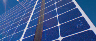 How do solar panels convert sunlight into electricity?