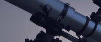 How does a telescope magnify distant objects?
