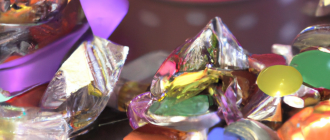 What is the process involved in creating remade candy wrapper jewelry?